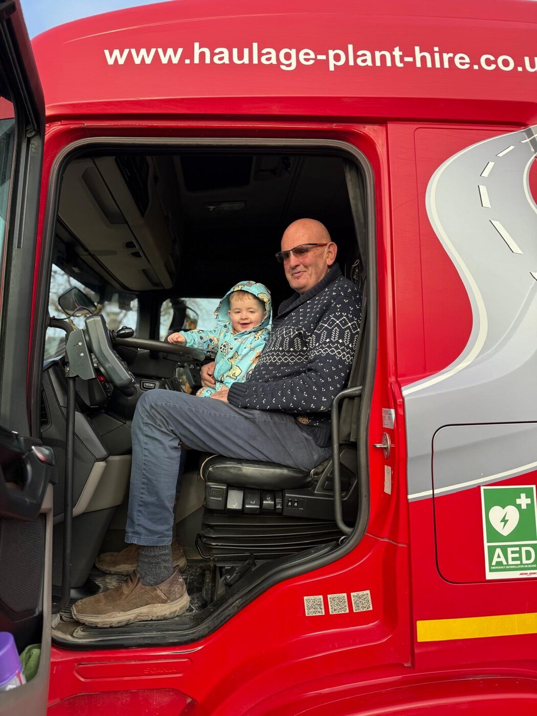 John Jones and Son cab photo with passenger