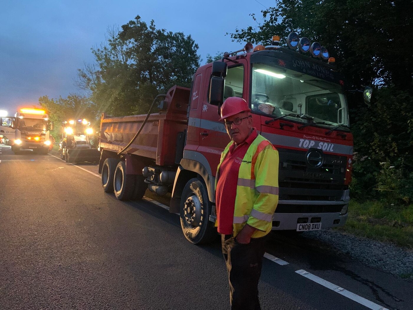 John Jones and Son topsoil lorry working at night