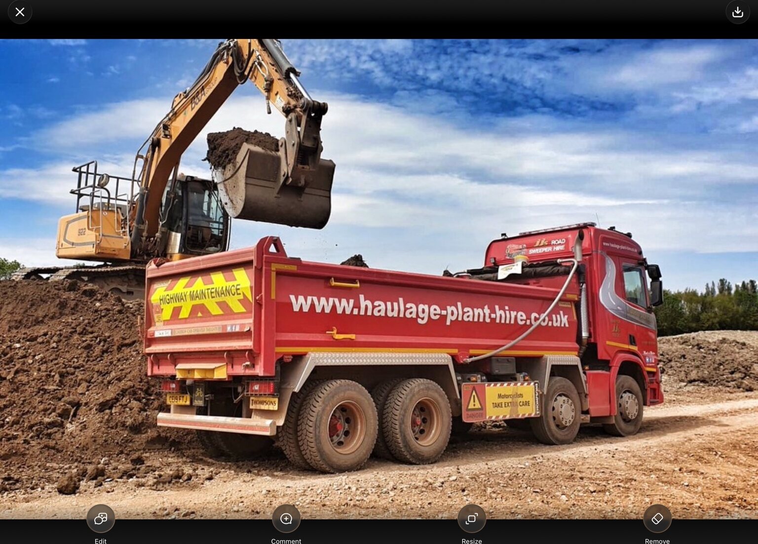 John Jones and Son tipper lorry being loaded with excavated material